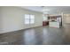 Spacious living room with wood flooring and a large window showcasing natural light at 11625 N 153Rd Dr, Surprise, AZ 85379
