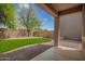 Patio overlooks the low-maintenance backyard with artificial grass at 11891 N 147Th Dr, Surprise, AZ 85379