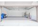 Spacious two-car garage with ample storage and utility connections at 11891 N 147Th Dr, Surprise, AZ 85379