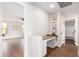 Inviting hallway area showcasing a desk, tasteful décor, and connecting rooms at 11891 N 147Th Dr, Surprise, AZ 85379