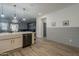 Stylish kitchen featuring stainless steel appliances and a large island at 13140 W Rowel Rd, Peoria, AZ 85383