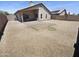 Gated backyard with patio and low maintenance desert landscaping at 14065 W Cornerstone Trl, Surprise, AZ 85374