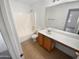 Bathroom featuring a vanity sink with lots of counter space and a bathtub at 14065 W Cornerstone Trl, Surprise, AZ 85374