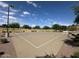 Outdoor basketball court with well-maintained surface and landscaping, providing a recreational amenity for residents at 15301 W Moreland St, Goodyear, AZ 85338