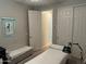 Bedroom with a white massage table at 15301 W Moreland St, Goodyear, AZ 85338