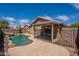 Relaxing pool and outdoor living space offers privacy, perfect for entertaining guests at 15725 W Lundberg St, Surprise, AZ 85374