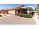 A spacious backyard includes a large covered patio and well manicured landscaping at 1625 E Daisy St, Casa Grande, AZ 85122