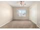 Bedroom featuring ceiling fan and bright window view at 1625 E Daisy St, Casa Grande, AZ 85122