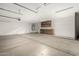 This three-car garage includes storage cabinets and room for projects at 1625 E Daisy St, Casa Grande, AZ 85122