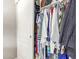 Walk-in closet with an array of clothing items hanging and stored on the shelves at 16337 W Pierce St, Goodyear, AZ 85338