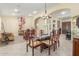 Elegant dining room featuring a marble table, arched doorways, and unique décor at 16337 W Pierce St, Goodyear, AZ 85338