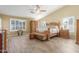 Tranquil main bedroom featuring vaulted ceiling, wood floors, and ample natural light at 16337 W Pierce St, Goodyear, AZ 85338