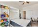 Murphy bed and built-in shelves maximize space in this bedroom at 16398 N Oachs Dr, Surprise, AZ 85374