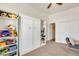 Bedroom showcases a Murphy bed and built-in shelves for organization at 16398 N Oachs Dr, Surprise, AZ 85374