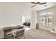 Bright bonus room with desk, chair and natural light at 16398 N Oachs Dr, Surprise, AZ 85374
