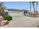 Charming single-story home with a three car garage and desert landscaping at 16398 N Oachs Dr, Surprise, AZ 85374