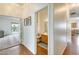 Hallway view to bathroom and living space with pool view at 16398 N Oachs Dr, Surprise, AZ 85374