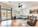 Comfortable living room provides a view of the pool and backyard at 16398 N Oachs Dr, Surprise, AZ 85374