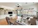 The inviting living room features built-in shelves and access to backyard at 16398 N Oachs Dr, Surprise, AZ 85374