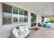 Cozy covered patio with comfortable seating, providing an inviting outdoor living space at 16398 N Oachs Dr, Surprise, AZ 85374