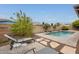 Private pool and patio area, perfect for relaxation and entertainment at 16398 N Oachs Dr, Surprise, AZ 85374
