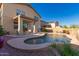 Beautiful backyard featuring a private pool, covered patio, and well-manicured landscape creating a perfect outdoor sanctuary at 1721 E Cielo Grande Ave, Phoenix, AZ 85024