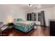 Cozy bedroom with modern decor, stylish bedding, and ample natural light at 1721 E Cielo Grande Ave, Phoenix, AZ 85024