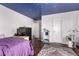 Bedroom with unique ceiling, wood floors, and white trim at 1721 E Cielo Grande Ave, Phoenix, AZ 85024