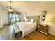 Bright primary bedroom with natural light, a sitting area, and neutral decor at 18507 N 94Th St, Scottsdale, AZ 85255