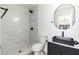 Modern bathroom showcasing a walk-in shower and stylish black fixtures at 1916 W Morningside Dr # 111, Phoenix, AZ 85023