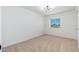 Cozy bedroom with neutral carpet, a bright window, and ample natural light at 1916 W Morningside Dr # 111, Phoenix, AZ 85023