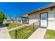 Community entrance to the pool surrounded by grass at 1916 W Morningside Dr # 111, Phoenix, AZ 85023