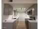 Modern kitchen features gray cabinets, stainless steel appliances, and quartz countertops at 1916 W Morningside Dr # 111, Phoenix, AZ 85023