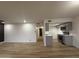Open floor plan features wood floors, recessed lighting, and a modern kitchen at 1916 W Morningside Dr # 111, Phoenix, AZ 85023