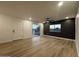 Bright living room with wood floors, ceiling fan, and sliding glass doors at 1916 W Morningside Dr # 111, Phoenix, AZ 85023