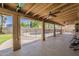 Large covered patio area overlooking the backyard and pool at 1927 E Ranch Rd, Tempe, AZ 85284