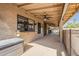 Large covered backyard patio features an exterior bar area for entertaining at 1927 E Ranch Rd, Tempe, AZ 85284