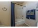 Bathroom featuring a bathtub, shower, towel bar, and a curtain at 1927 E Ranch Rd, Tempe, AZ 85284