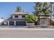 Charming two-story home featuring a three-car garage and a well-maintained front yard at 1927 E Ranch Rd, Tempe, AZ 85284