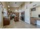 Kitchen with tile floors, granite countertops, stainless steel appliances, and a functional island at 1927 E Ranch Rd, Tempe, AZ 85284