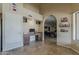 Spacious kitchen with granite countertops, wood cabinets, tile floors and a functional desk area at 1927 E Ranch Rd, Tempe, AZ 85284