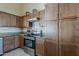 Kitchen with granite countertops, stainless steel appliances, and plentiful cabinet storage at 1927 E Ranch Rd, Tempe, AZ 85284