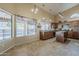 Eat-in kitchen featuring tile flooring, lots of windows and abundant workspace and wood cabinetry at 1927 E Ranch Rd, Tempe, AZ 85284