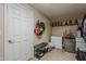 Mud room with bench, storage, and appliances at 1927 E Ranch Rd, Tempe, AZ 85284