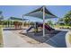 Community playground with multiple colorful slides and play structures, offering endless entertainment at 1927 E Ranch Rd, Tempe, AZ 85284