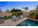 Relaxing backyard sitting area with chairs, lounge area and privacy at 19905 E Apricot Ln, Queen Creek, AZ 85142