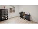 Study room with modern desk and shelf, tile flooring and natural light at 19905 E Apricot Ln, Queen Creek, AZ 85142