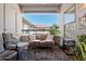Cozy outdoor balcony featuring comfortable seating and stylish decor with an opening offering a view of blue skies at 20121 N 76Th St # 2006, Scottsdale, AZ 85255