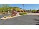 Community entrance with attractive sign and well-maintained landscaping at 20121 N 76Th St # 2006, Scottsdale, AZ 85255