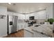 Modern kitchen features granite counters, stainless appliances, and ample natural light at 20121 N 76Th St # 2006, Scottsdale, AZ 85255